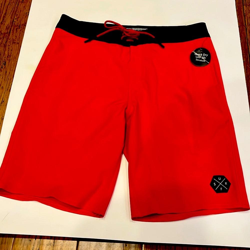 Size 28 Swim Trunks Men’s Brand New with Tags 
Red 9inch inseam